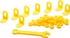 A collection of yellow plastic building blocks, nuts, and a wrench, arranged on a white background. Anteprima dell’immagine prodotto