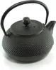 A black cast iron teapot is shown against a white background. Podgląd zdjęcia produktu