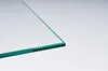 A close-up, angled view of the edge of a piece of glass. Produktbild-Vorschau
