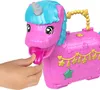 A hand is pulling the tongue of a pink unicorn piñata toy. Náhled obrázku produktu