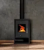 A black wood-burning stove with a fire inside, set against a textured gray wall and a wooden floor. Náhled obrázku produktu