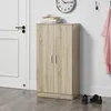 A shoe cabinet with two doors, a stack of books on top, and a clock on the wall. Produktbild-Vorschau