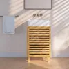A bathroom vanity with a sink and towel. Podgląd zdjęcia produktu