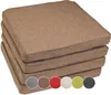 A stack of four brown cushions is shown against a white background. Produktbild-Vorschau