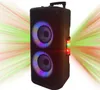 A black trolley speaker with colorful LED lights on the speakers and a side panel, set against a background with light streaks. Voir les images du produit