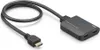 A black HDMI splitter with two output ports and one input cable is shown on a white background. Voir les images du produit