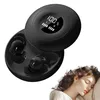 A pair of black wireless earbuds in their charging case, with a digital display showing battery percentage, and a woman sleeping peacefully with an earbud in her ear. Produktbild-Vorschau