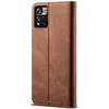 A brown leather flip wallet case for a smartphone is shown against a white background. Produktbild-Vorschau