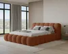A modern bedroom with a large bed, large windows with curtains, and a view of trees and hills outside. Voir les images du produit