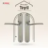 A marketing image featuring two door handles against a decorative background. Produktbild-Vorschau