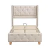 A beige upholstered bed frame with a tufted headboard and footboard, shown from the front. Náhled obrázku produktu