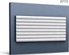 A white decorative wall panel with a ribbed texture is mounted on a dark blue wall. Náhľad obrázku produktu