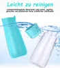 A turquoise bottle and its cap are submerged in water, with a clear bottle also in the water. Produktbild-Vorschau