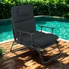 A black recliner chair is placed on a wooden deck next to a swimming pool. Produktbild-Vorschau
