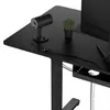 A close-up view of a black desk with a webcam and a small potted plant. Anteprima dell’immagine prodotto