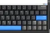 A close-up view of a black mechanical keyboard with blue accents. Produktbild-Vorschau