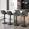Four dark gray bar stools are arranged in a modern kitchen setting. Produktbild-Vorschau