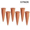 Six terracotta plant watering spikes are arranged on a white background, with the text '6 PACK' in the upper right corner. Produktbild-Vorschau