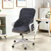 A dark gray office chair cushion with a quilted pattern is shown in a well-lit room with a desk and cabinets in the background. Voir les images du produit