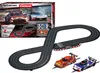 A Carrera Evolution slot car racing track set with two cars and the product box. Produktbild-Vorschau