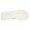 The sole of a sneaker is shown against a white background. Voir les images du produit
