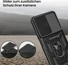A close-up of a black phone case with a camera slider and ring holder, set against a blurred background of hills and dry ground. Produktbild-Vorschau
