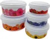 A set of five round plastic storage containers with lids, stacked and arranged in two groups. Each container has a decorative floral pattern around its base. Produktbild-Vorschau