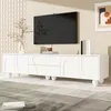 A white TV stand with a television mounted above it, in a minimalist living room setting. Podgląd zdjęcia produktu
