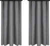 Two gray curtains hanging side-by-side against a white background. Náhled obrázku produktu