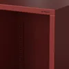 A close-up view of a red metal shelf unit. Voir les images du produit