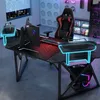 A gaming desk setup in a room with neon lighting. Produktbild-Vorschau