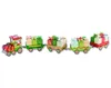 A Christmas advent calendar shaped like a train, with gift boxes on top of each carriage. Anteprima dell’immagine prodotto