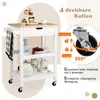 A white kitchen cart with a bamboo top is shown with various items on its shelves. The cart has wheels and a towel hanging from the side. Text and diagrams highlight the cart's features. Produktbild-Vorschau