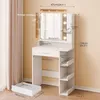 A white vanity table with a mirror and LED lights, showing dimensions and assembly instructions. Produktbild-Vorschau