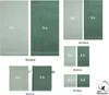 A collage of different sizes and quantities of towels in green and light green colors. Produktbild-Vorschau