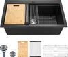 A black kitchen sink with accessories laid out below it. Produktbild-Vorschau