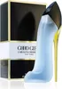 A perfume bottle shaped like a high heel, next to its packaging. Podgląd zdjęcia produktu