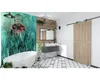 A modern bathroom with a bathtub, vanity, and a sliding barn door. Náhled obrázku produktu