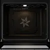 The interior of an oven with the door open. Voir les images du produit