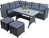 A black polyrattan outdoor seating set with gray cushions and a glass-topped table, presented on a white background. Produktbild-Vorschau