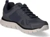 A single navy blue Skechers athletic shoe is shown from a side-angle on a white background. Voir les images du produit