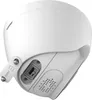 A close-up view of the back of a white security camera, showing ports and a speaker grille. Náhled obrázku produktu