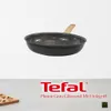A frying pan with a wooden handle is displayed against a white background, with brand and product information below. Náhľad obrázku produktu