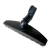 A vacuum cleaner attachment with bristles. Produktbild-Vorschau