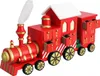 A red wooden advent calendar shaped like a train, with numbered drawers. Produktbild-Vorschau