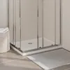 A close-up view of a shower tray and enclosure in a bathroom. Náhled obrázku produktu