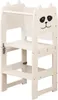 A white wooden learning tower for children, designed with a panda face on the front. Podgląd zdjęcia produktu