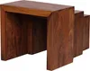 A set of three nesting tables made of dark brown wood. Voir les images du produit