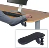 A person's arm resting on an ergonomic armrest attached to a desk. Podgląd zdjęcia produktu