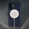 A close-up view of an iPhone case with a MagSafe charger attached. Produktbild-Vorschau